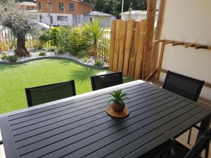 Vonkajšia záhrada v ubytovaní Dune Blanche 300 m de l'Océan, appartement neuf 6 personnes