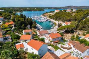 an aerial view of a harbor with boats in the water at Villa Ameli in Milna