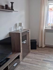 Kuchyň nebo kuchyňský kout v ubytování Altstadtperle + 17 fotografií