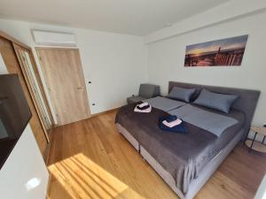 Postel nebo postele na pokoji v ubytování APP MARE Umag