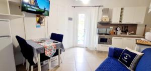 A kitchen or kitchenette at Casa Pomonte