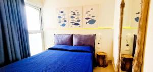 A bed or beds in a room at Casa Pomonte
