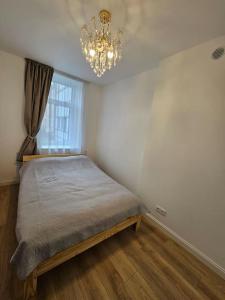 Ένα ή περισσότερα κρεβάτια σε δωμάτιο στο Lunar Luxury Appartment Boulevard View High Street