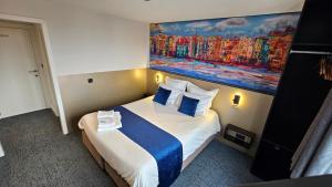 Voodi või voodid majutusasutuse Elberg Hotel & Apartments toas