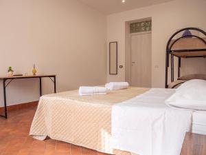 A bed or beds in a room at Aliva apartment LT