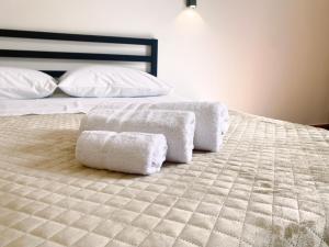 A bed or beds in a room at Aliva apartment LT