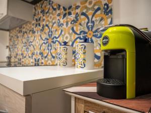 A kitchen or kitchenette at Aliva apartment LT