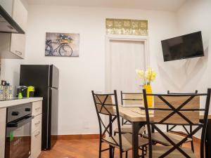 A kitchen or kitchenette at Aliva apartment LT
