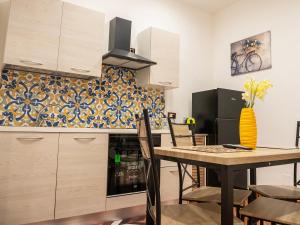 A kitchen or kitchenette at Aliva apartment LT