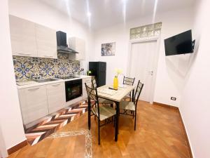 A television and/or entertainment centre at Aliva apartment LT
