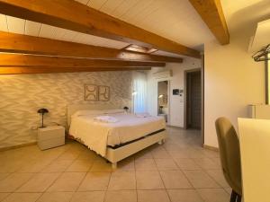 Voodi või voodid majutusasutuse Albergo Perseo toas