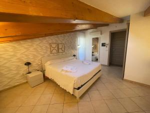 Voodi või voodid majutusasutuse Albergo Perseo toas