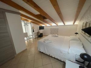 Voodi või voodid majutusasutuse Albergo Perseo toas