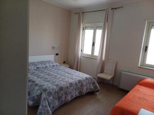 Ένα ή περισσότερα κρεβάτια σε δωμάτιο στο La Magnolia +7 φωτογραφίες