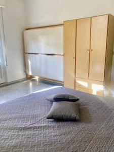 Postel nebo postele na pokoji v ubytování Hotel Villa Pozzi