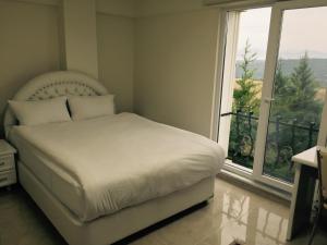 Postel nebo postele na pokoji v ubytování HD Miray Otel + 29 fotografií
