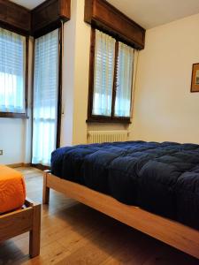 Postel nebo postele na pokoji v ubytování Casa Righini