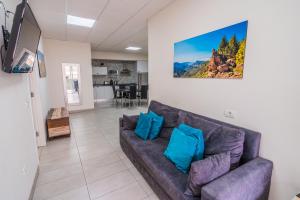Χώρος καθιστικού στο El Puente Holiday Home -Airport