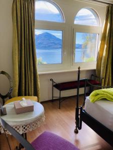 Rúm í herbergi á BnB122 bed&breakfast