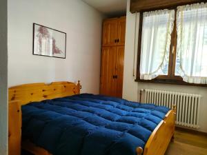 Postel nebo postele na pokoji v ubytování Casa Righini
