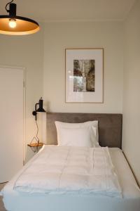 Postel nebo postele na pokoji v ubytování 21rooms Apartments