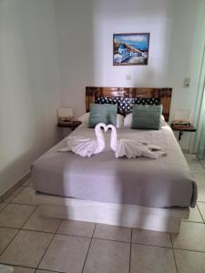 Letto o letti in una camera di Pension Stella