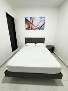 Postel nebo postele na pokoji v ubytování HOTEL LE QUINT + 3 fotografie