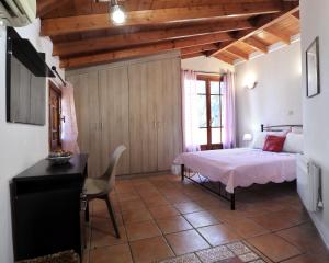 Ένα ή περισσότερα κρεβάτια σε δωμάτιο στο Terpi House