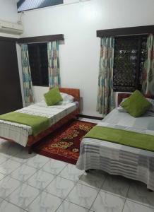 מיטה או מיטות בחדר ב-Villa 109