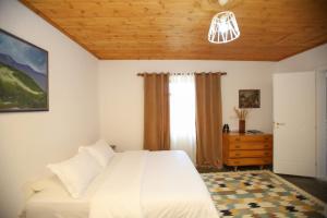 Postelja oz. postelje v sobi nastanitve Guest House Bashaj Village
