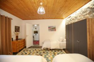 Postelja oz. postelje v sobi nastanitve Guest House Bashaj Village