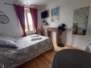 Postel nebo postele na pokoji v ubytování La cocotte normande