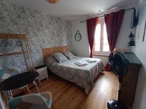 Postel nebo postele na pokoji v ubytování La cocotte normande