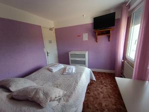 Postel nebo postele na pokoji v ubytování La cocotte normande