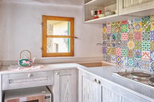 Kuchyň nebo kuchyňský kout v ubytování Biancalana Apartment