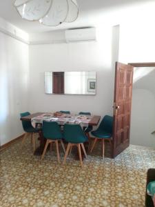 a dining room with a table and chairs at casa vacanza Sulmona centro in Sulmona