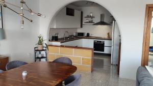 A kitchen or kitchenette at Marsaxlokk Sea Front Apartment