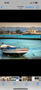 a picture of a boat in the water at A CASA DEL CONSOLE in Mondello