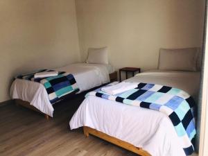 Postel nebo postele na pokoji v ubytování Hotel & Golf Isak Aeropuerto