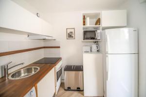 Kuchyňa alebo kuchynka v ubytovaní T2 Prestance Montpellier Proche Plage Parking