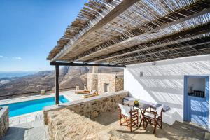 a villa with a view of the mountains at La Casa del Pastore in Serifos Chora +8 photos
