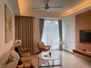 Area tempat duduk di Cormar Premium Suites KLCC Kuala Lumpur City Center