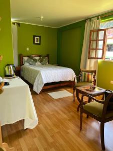 Postel nebo postele na pokoji v ubytování RESORT ALAPA