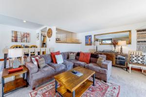 a living room with a couch and a table at Snowcreek 1536 in Sun Valley