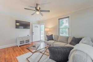 a living room with a couch and a ceiling fan at Prospect Place - 2BR 1 BA in Columbia