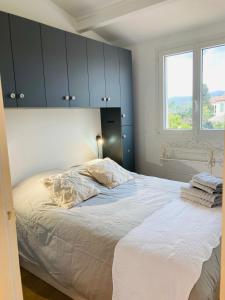 Ліжко або ліжка в номері MAZET Golfe de st Tropez