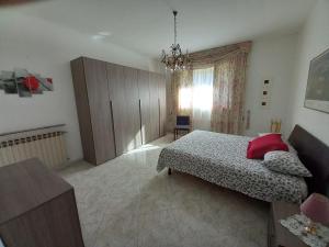 Posteľ alebo postele v izbe v ubytovaní la casa di sotto