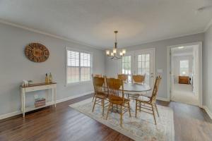 a dining room with a table and chairs at Lexington Home Near Main St in Lexington