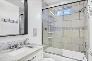 a bathroom with a shower and a sink at Modern Gem in Columbia in Columbia