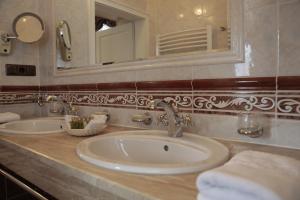 Kúpeľňa v ubytovaní Hotel Vila Livia